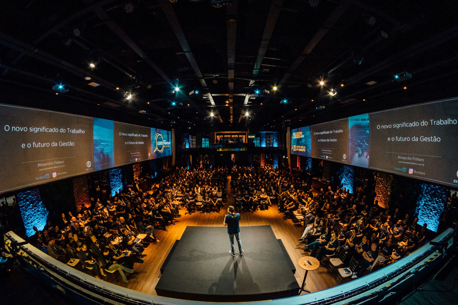 Conference stage with crowd